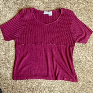 Short sleeve with scoop diamond neck.  Beads and delicate flowers. Ribbed knit